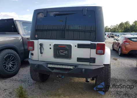 2012 Jeep Wrangler Unlimited Sahara from USA, damaged, VIN 1C4BJWEG2CL133537